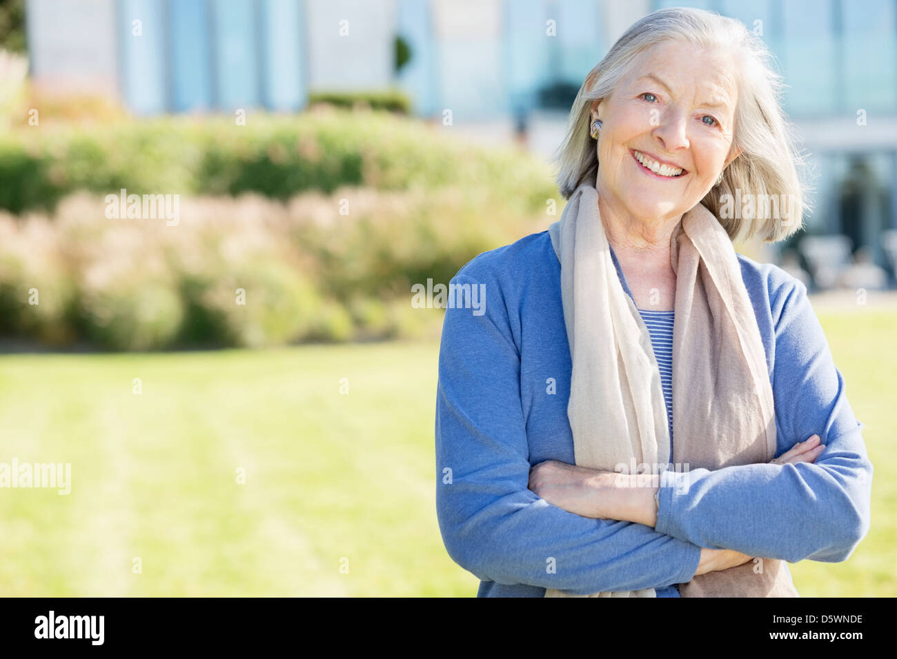 Old lady crossing arms hi-res stock photography and images - Alamy