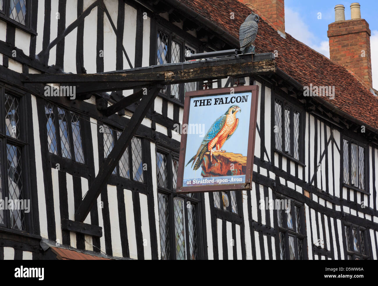 Pub sign for the Legacy Falcon Hotel 16th century black and white timbered building Stratford-upon-Avon Warwickshire England UK Great Britain Stock Photo