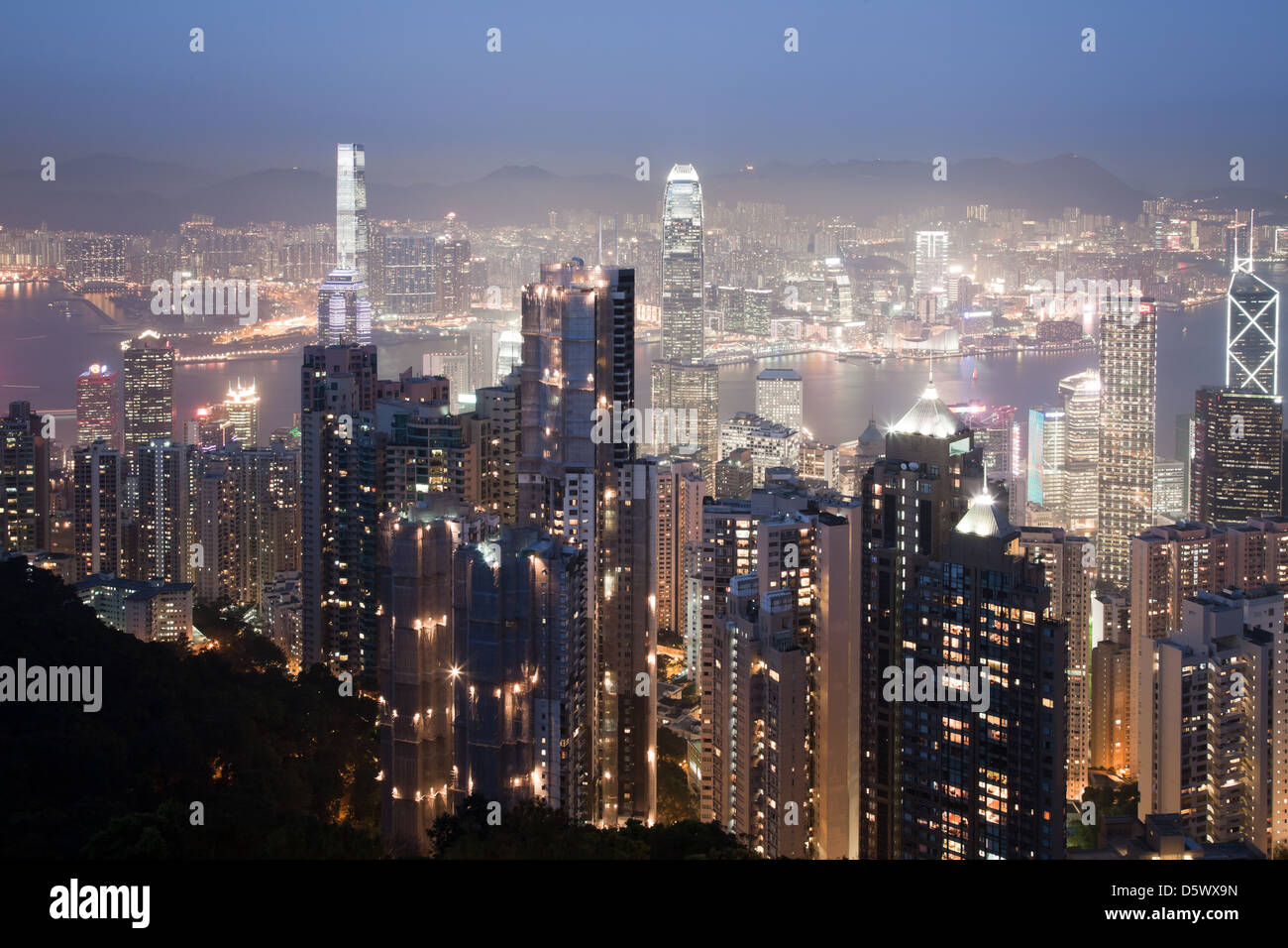 Hong Kong downtown at night lighting Stock Photo - Alamy