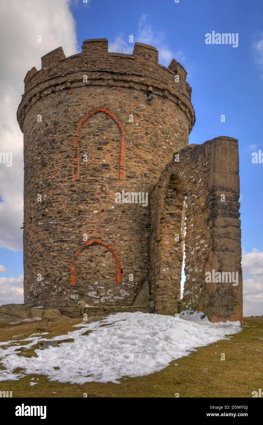 HDR image of Old John Tower in the snow at Bradgate Country Park, Leicestershire, England, Uk Stock Photo