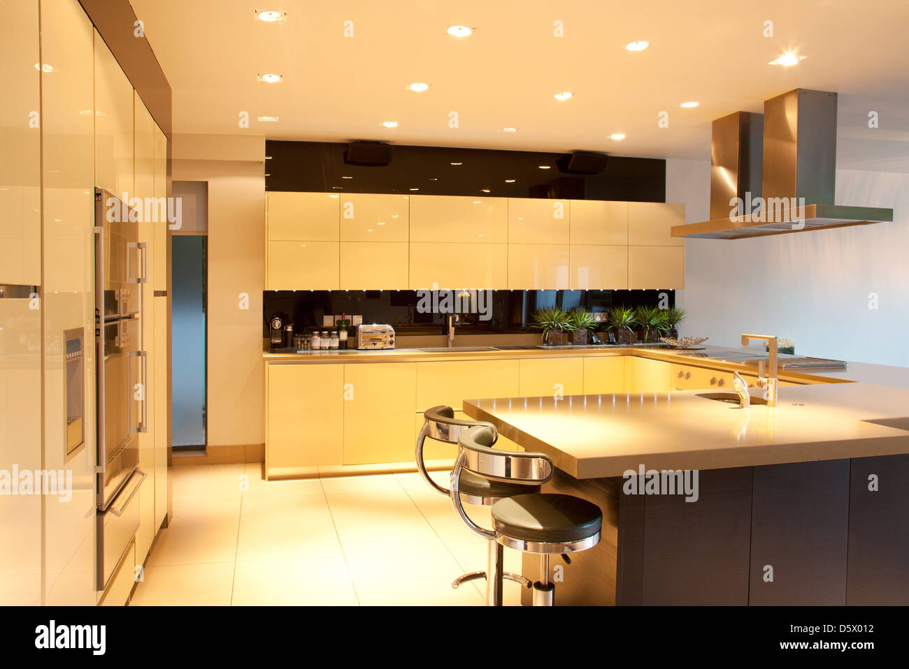 Counters and lighting in modern kitchen Stock Photo