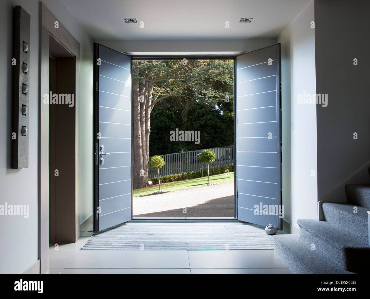 Front doors and walkway of modern home Stock Photo