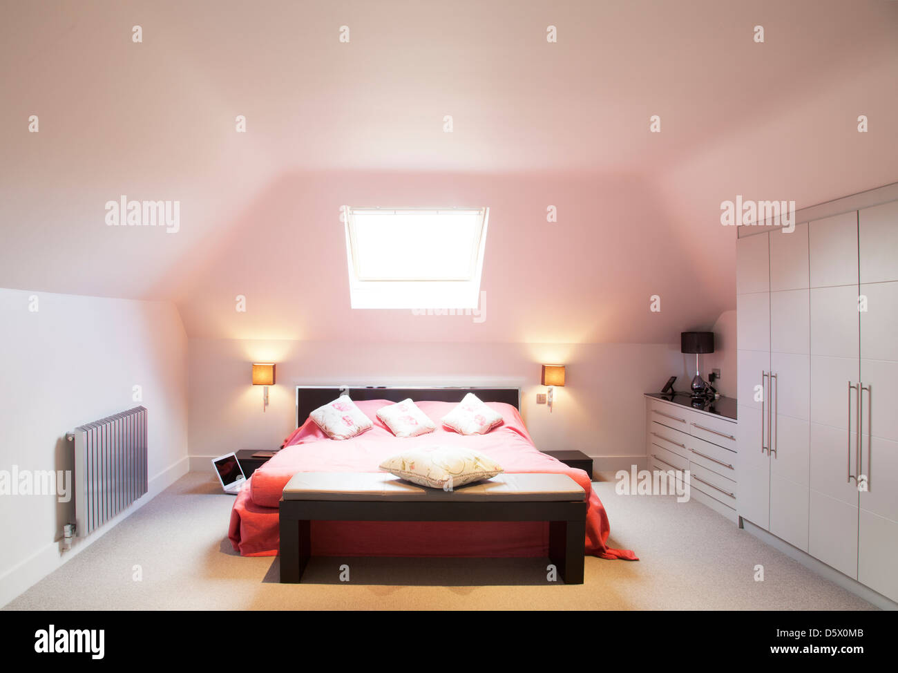 Bed and window in modern bedroom Stock Photo
