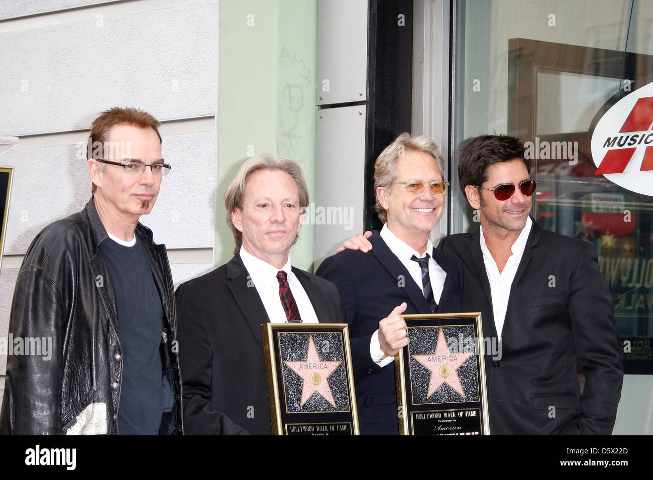 Billy Bob Thornton; Gerry Beckley; Dewey Bunnell; John Stamos The group America is honored with a Star on the Hollywood Walk of Stock Photo