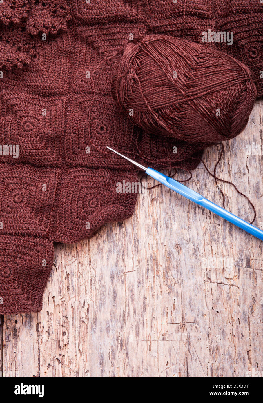 Crochet. Threads on a wooden surface Stock Photo