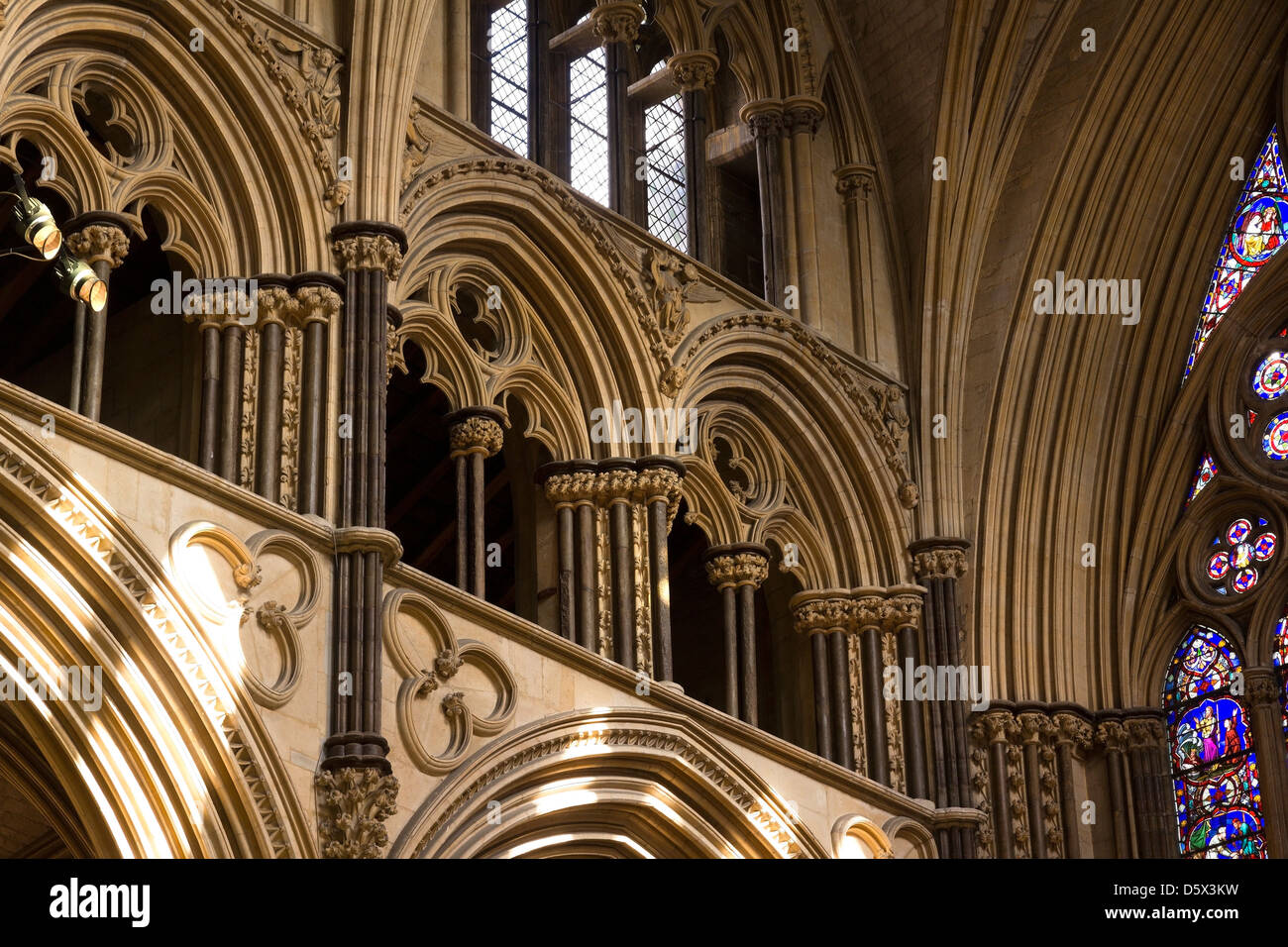 Pointed Gothic stone masonry arches in Angel Choir of Lincoln Cathedral, Lincolnshire, England, UK Stock Photo