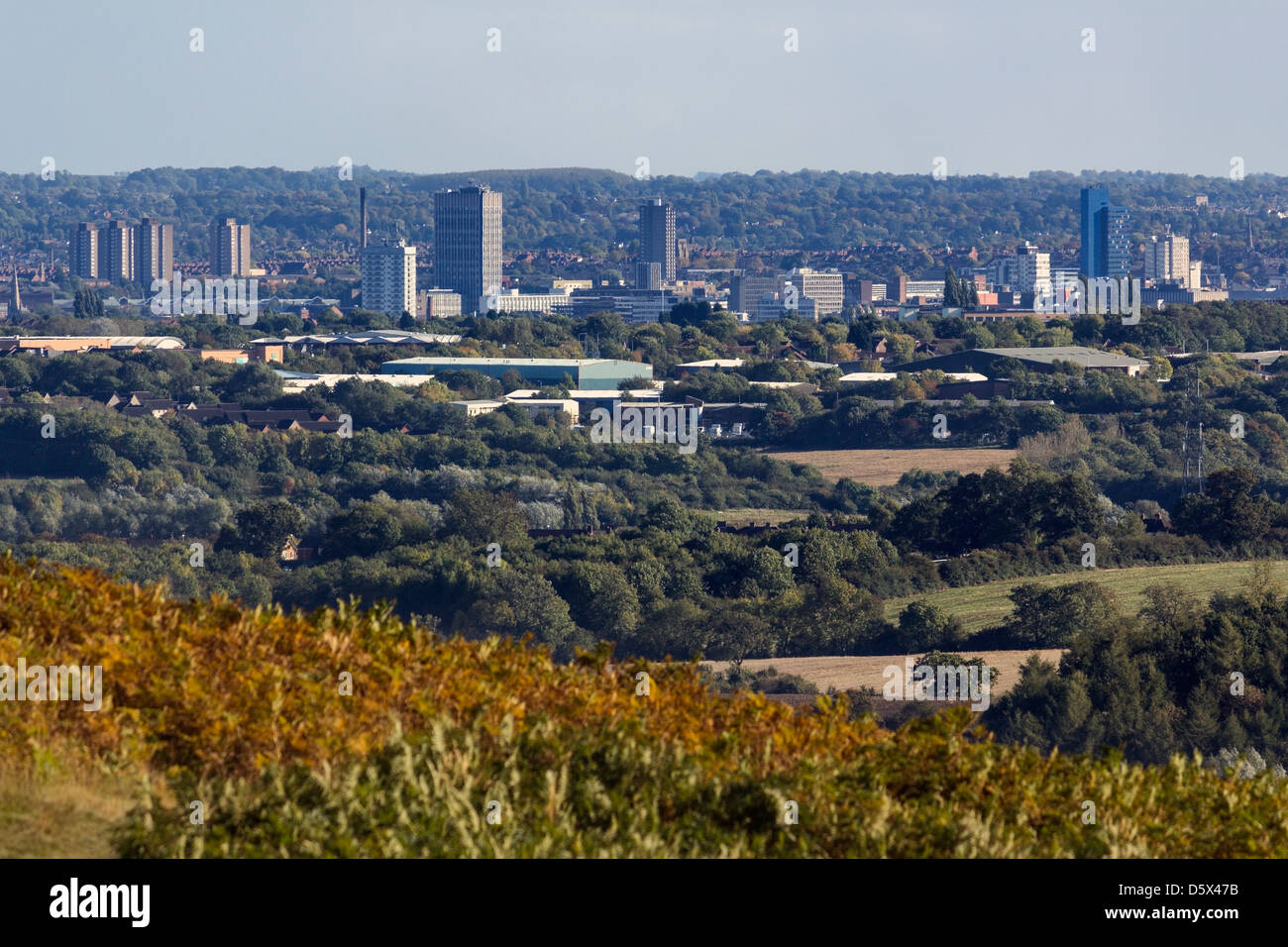 The city of Leicester in the distance as seen from countryside hilltop in Bradgate Park, Leicestershire, England, UK Stock Photo