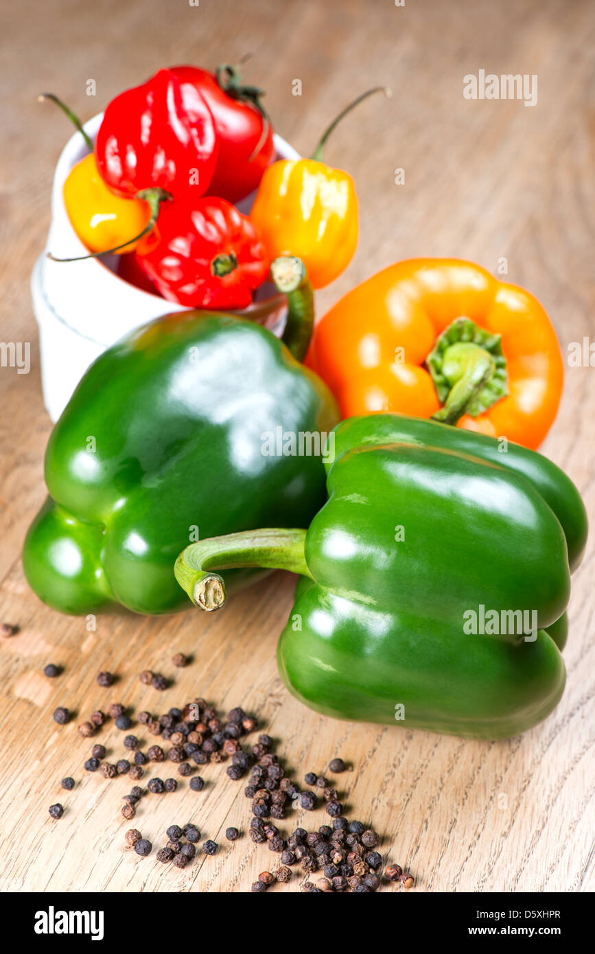Peppers on table Stock Photo - Alamy