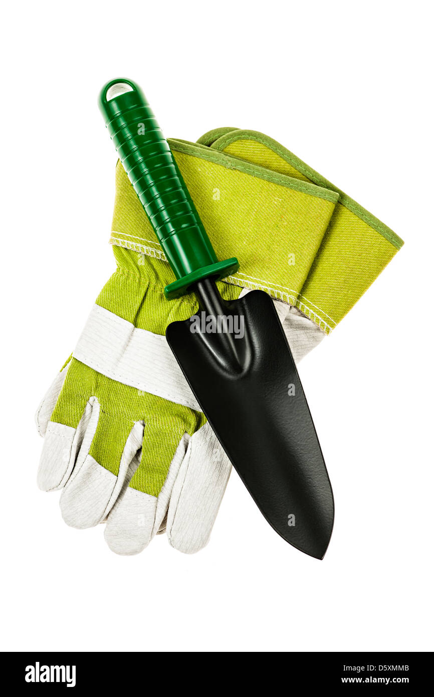 Gardening gloves and trowel isolated on white background Stock Photo