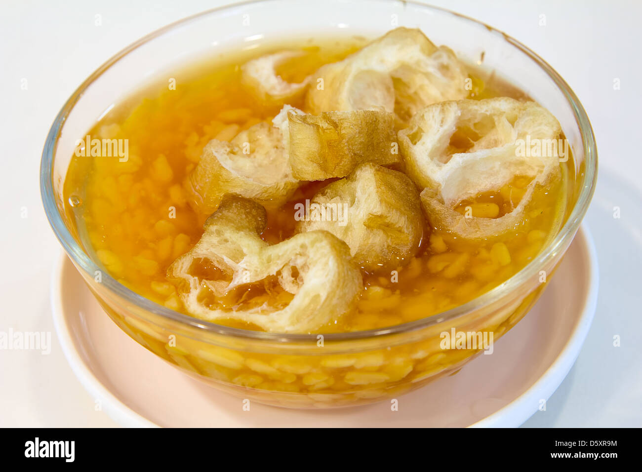 Split Mung Beans Sweet Dessert (Tau Suan) with Fried Dough Fritters (You Tiao) Closeup Stock Photo