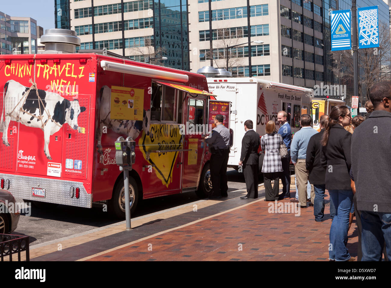 People in queue at a Chick-fil-A food truck - USA Stock Photo