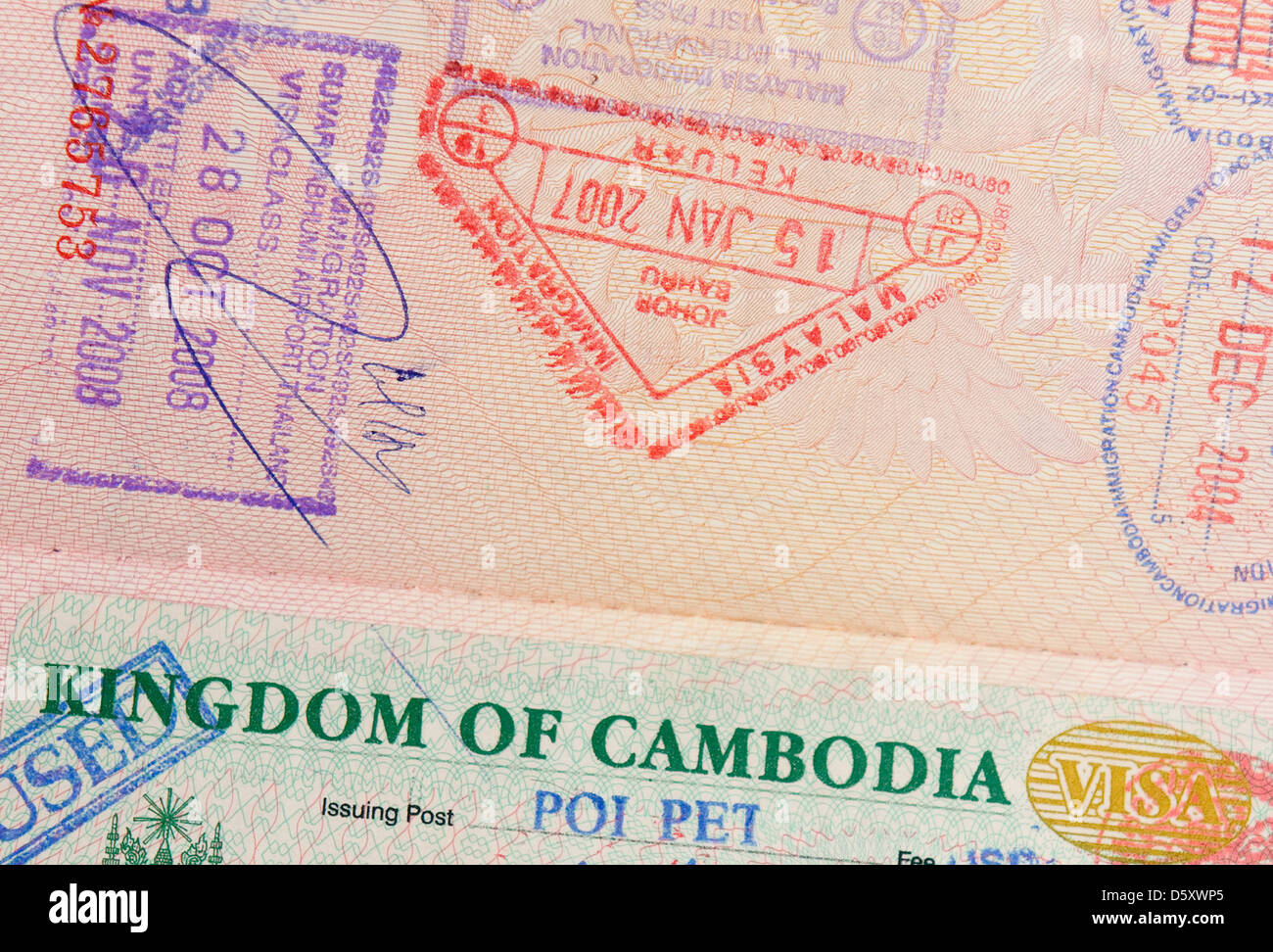 passport with malaysian and cambodian stamps Stock Photo Alamy