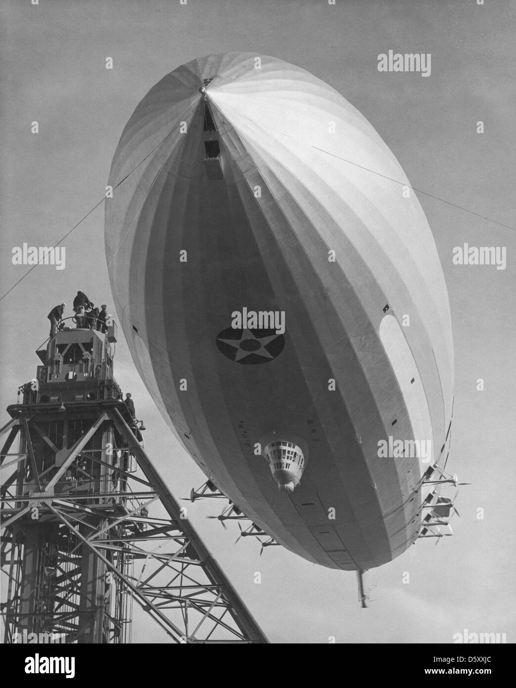 July 24, 1957 - Navy ZSC-1 pre-war Airship ties up at mooring platform in Yucca Flat, having just arrived from Lakehurst NAS to prepare for Atomic blast tests. Stock Photo