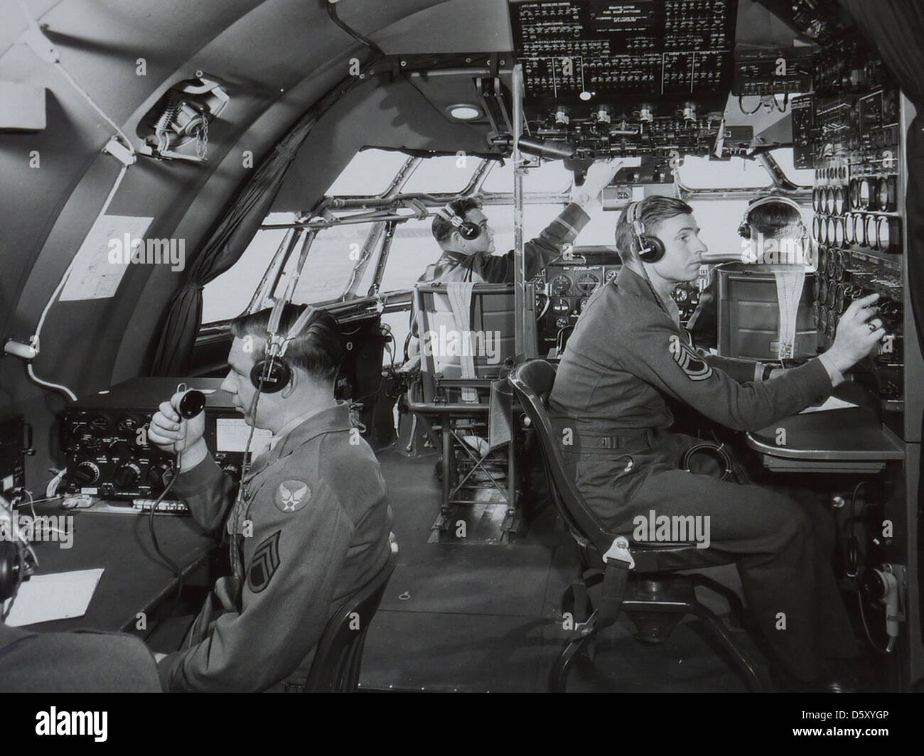 Crew in the cockpit of a Boeing C-97 'Stratofreighter'. Stock Photo