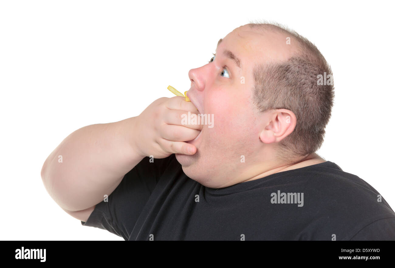 Fat Man Greedily Eating French Fries Stock Photo - Alamy