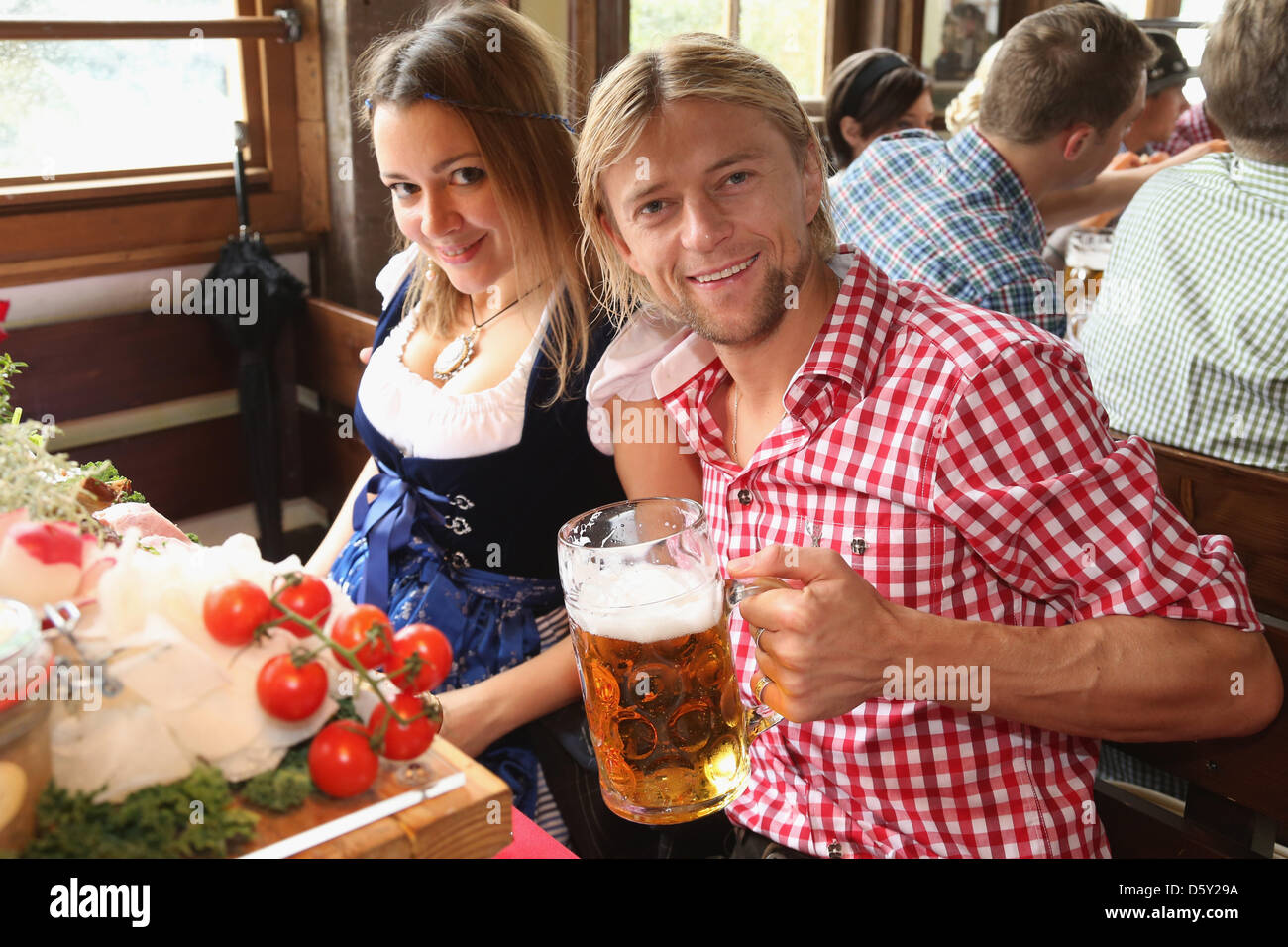 Anatoliy Tymoshchuk of FC Bayern Muenchen attends with wife Nadiya the