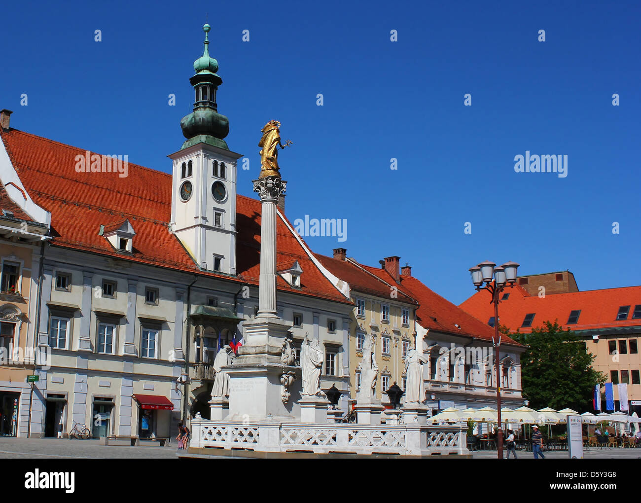 Maribor town main square with plague monument and city hall, Slovenia Stock Photo