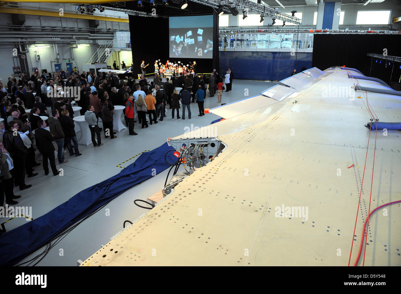 The first wing of the new long-range jet airliner Airbus A350-900 is cerewmoniously presented at the Airbus plant in Bremen, Germany, 12 October 2012. The A350 wings are undergo the final stages of assembly in Bremen. This particular wing is intended for the A350-900 prototype ans will transported to France for the final assembly of the A350-900 shortly. Photo: INGO WAGNER Stock Photo