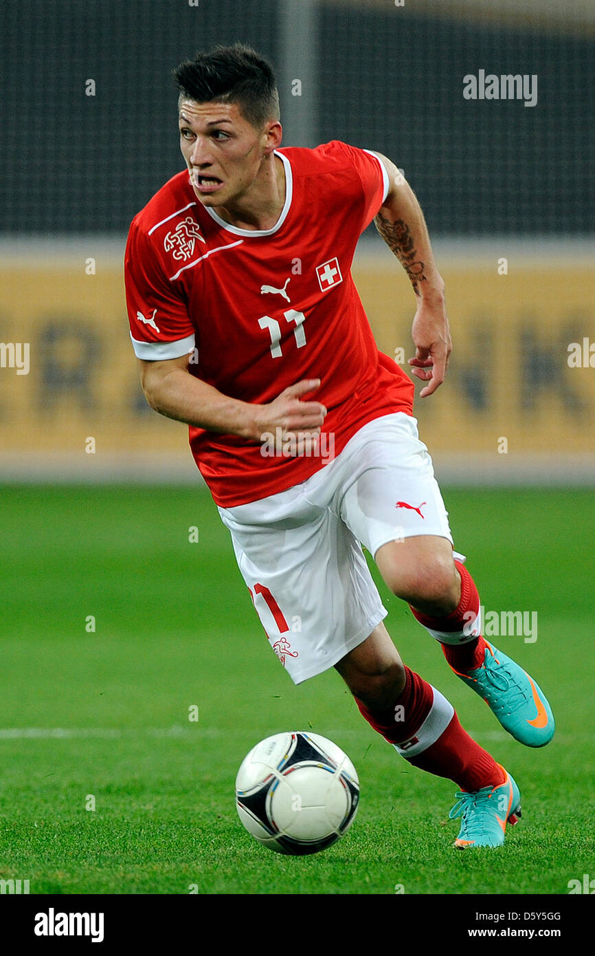 Switzerland's Steven Zuber dribbles the ball during the U 21 EURO qualifying soccer match Germany vs. Switzerland at BayArena in Leverkuen, Germany, 12 October 2012. The match ended 1:1. Photo: Marius Becker Stock Photo