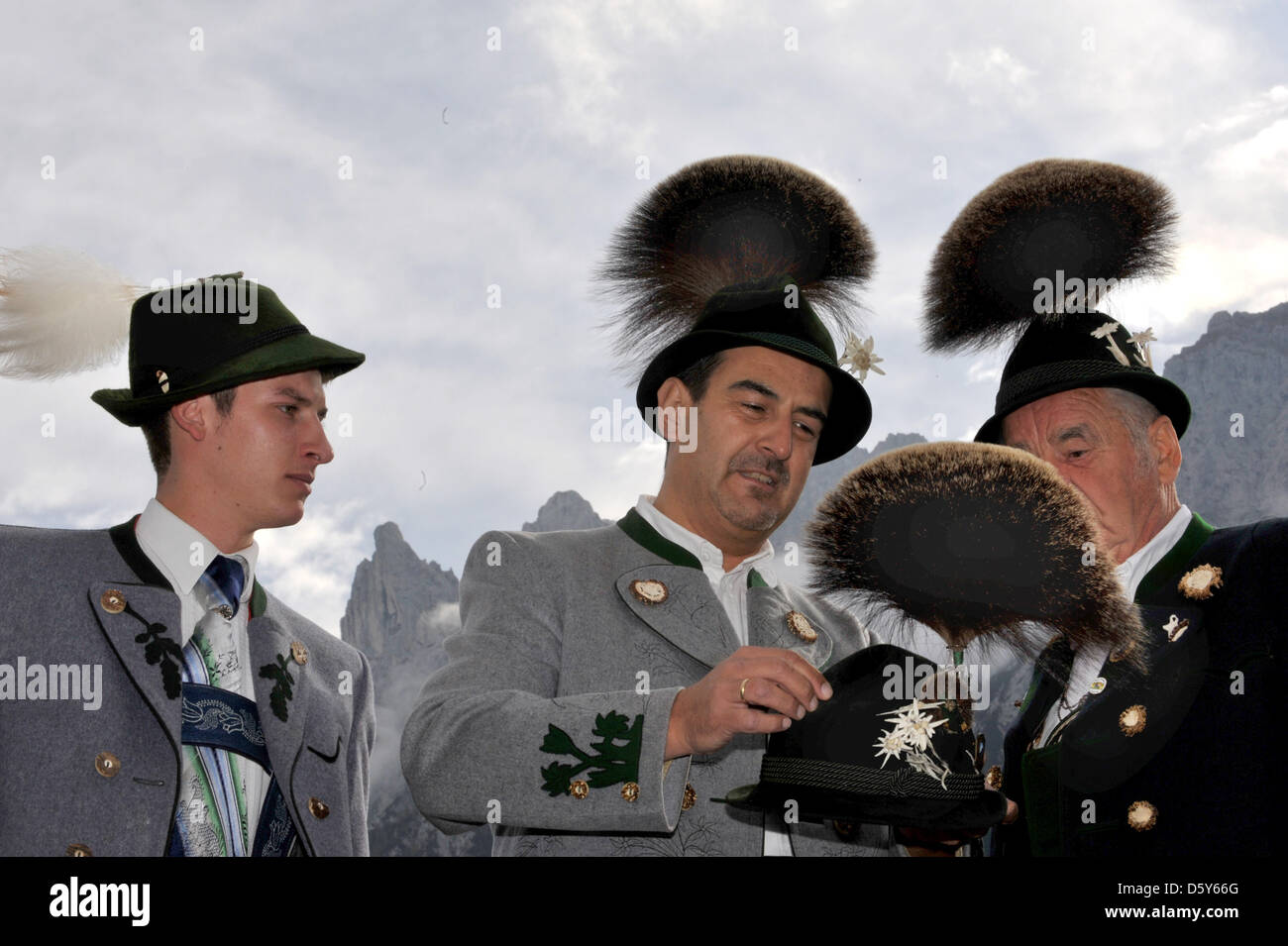 Participants of the 26th Gamsbart Olympics (lit. chamois beard olympics) wait for the award ceremony in Mittenwald, Germany, 14 October 2012. Up to 100 participants from different Apline areas competed at the event. Photo: Frank Leonhardt Stock Photo