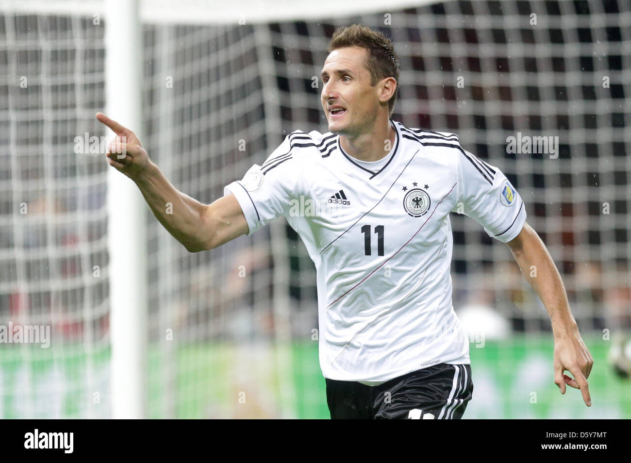 Germany's Miroslav Klose celebrates after scoring the first goal during the FIFA World Cup 2014 qualifying soccer match between Germany and Sweden at Olympic stadium in Berlin, Germany, 16 October 2012. Photo: Michael Kappeler/dpa  +++(c) dpa - Bildfunk+++ Stock Photo