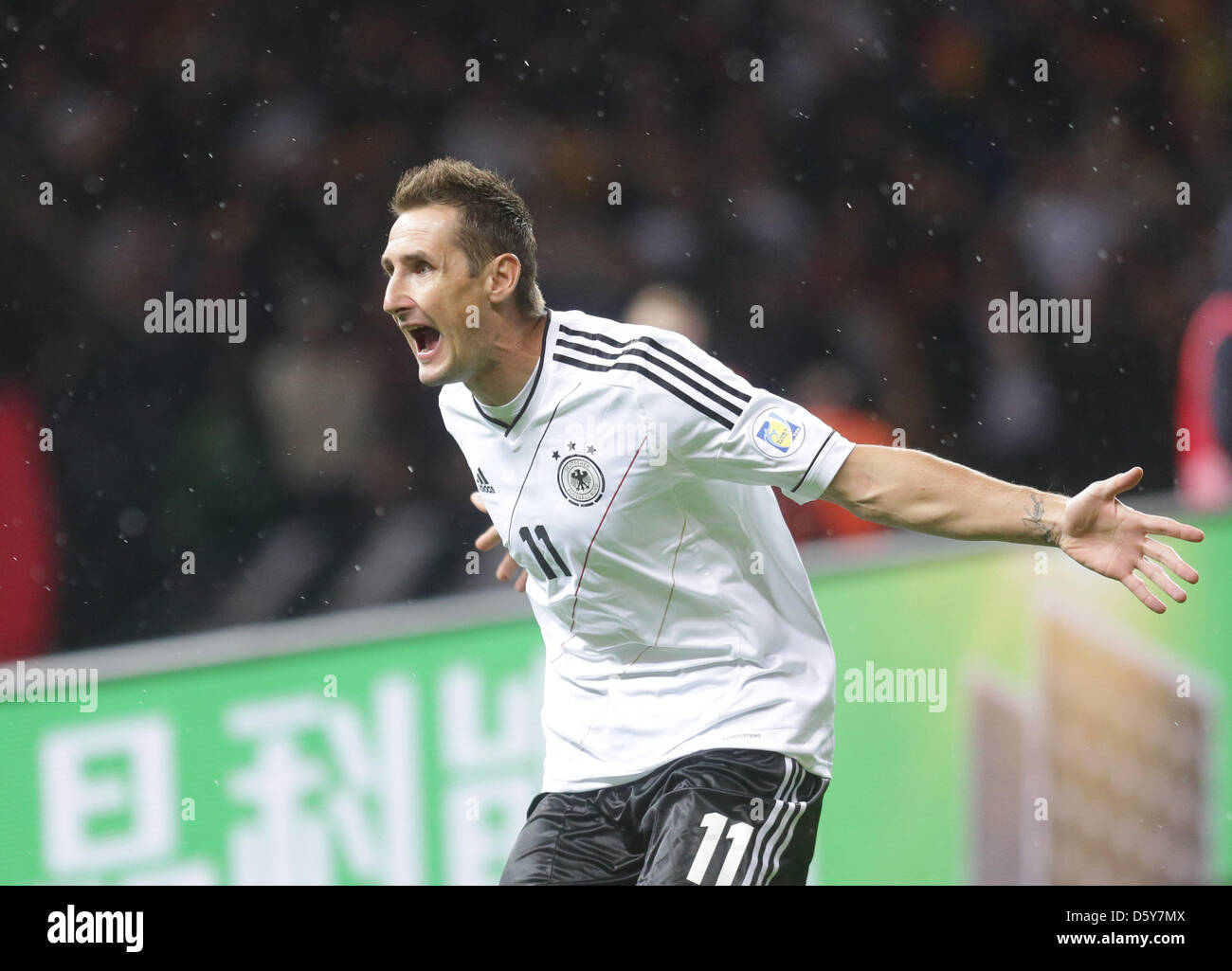 Germany's Miroslav Klose celebrates after scoring the opening goal 1-0 during the FIFA World Cup 2014 qualifying soccer match between Germany and Sweden at Olympic stadium in Berlin, Germany, 16 October 2012. Photo: Michael Kappeler/dpa  +++(c) dpa - Bildfunk+++ Stock Photo
