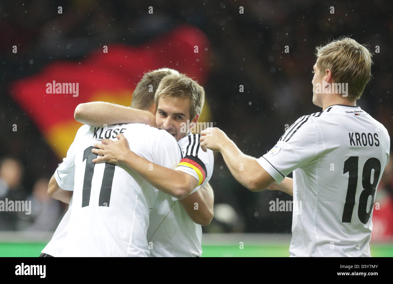 Germany's Miroslav Klose celebrates with team mates Philipp Lahm (C) and Toni Kroos after scoring the opening goal 1-0 during the FIFA World Cup 2014 qualifying soccer match between Germany and Sweden at Olympic stadium in Berlin, Germany, 16 October 2012. Photo: Michael Kappeler/dpa  +++(c) dpa - Bildfunk+++ Stock Photo