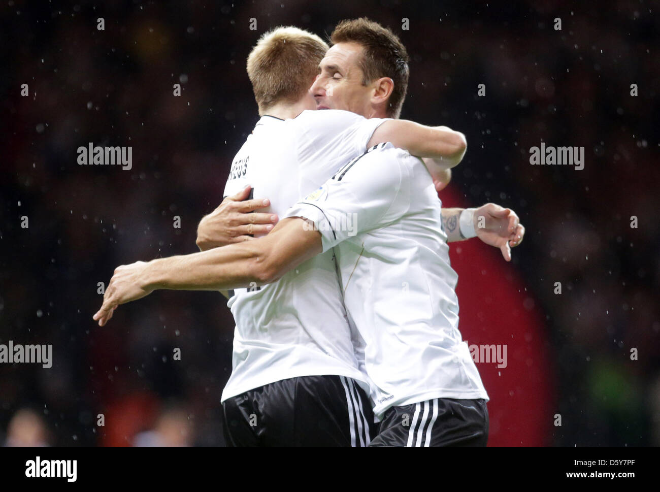 Germany's Miroslav Klose celebrates with team mate Marco Reus (L) after scoring the opening goal 1-0 during the FIFA World Cup 2014 qualifying soccer match between Germany and Sweden at Olympic stadium in Berlin, Germany, 16 October 2012. Photo: Michael Kappeler/dpa  +++(c) dpa - Bildfunk+++ Stock Photo