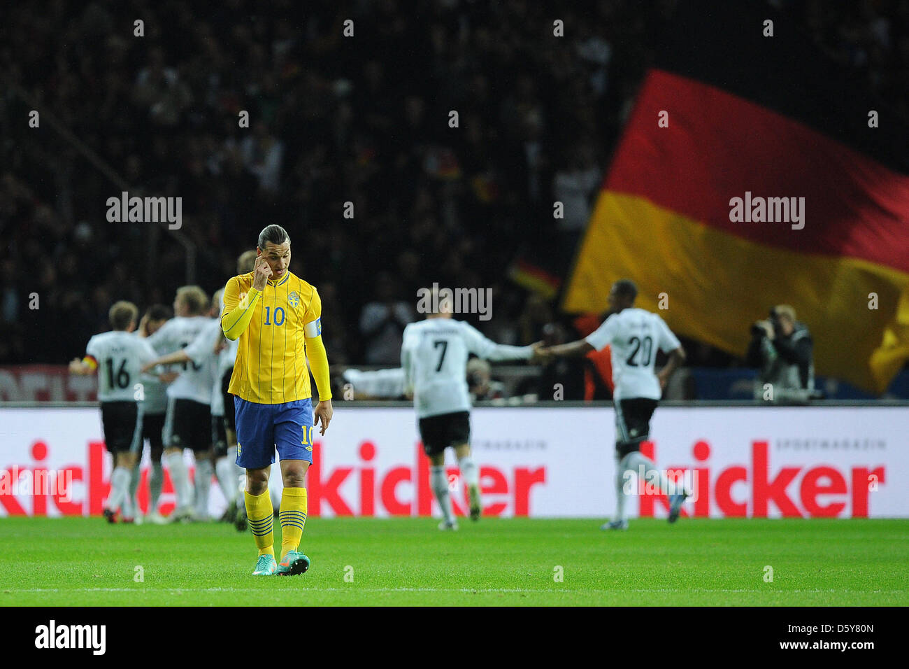 Germany celebrates the 2-0 goal by Miroslav Klose behind Sweden's Zlatan Ibrahimovic (front) during the FIFA World Cup 2014 qualifying soccer match between Germany and Sweden at Olympic stadium in Berlin, Germany, 16 October 2012. Photo: Revierfoto Stock Photo