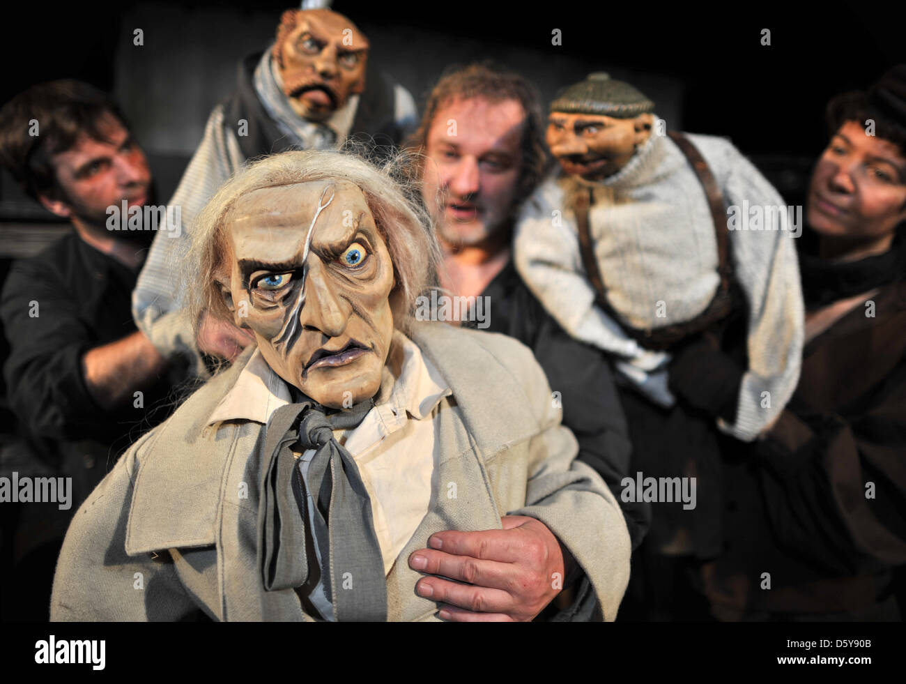 Puppetier Bernd Haeussler, Detlef Plath and Gundula Hoffmann stand with figures from the play "Moby Dick" on the stage of the puppet theater in Zwickau, Germany, 18 October 2012. The puppet theater is turning 60 and will celebrate with a festival week and the play "Moby Dick". Photo: Hendrik Schmidt Stock Photo