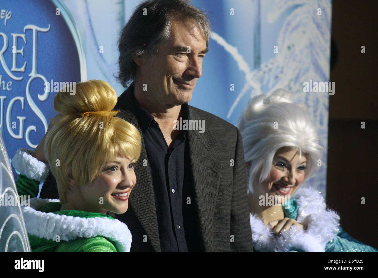 British actor Timothy Dalton poses with two actresses dressed as fairies at the premiere of the Walt Disney movie 'Secret of the Wings' in New York, USA, 20 October 2012. Photo: Christina Horsten Stock Photo