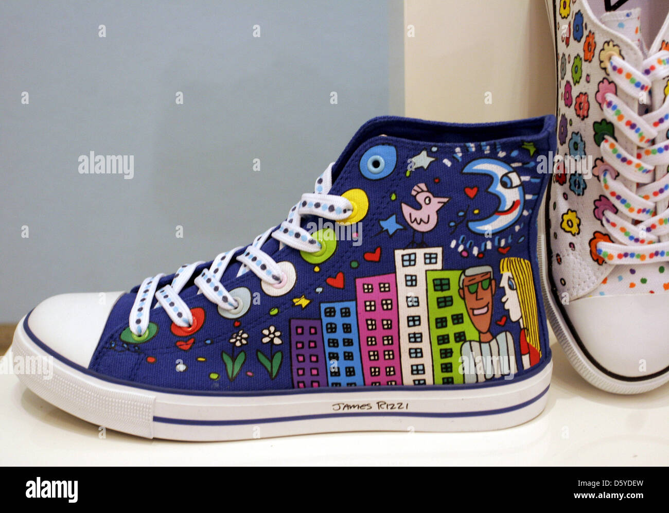 Shoes designed by US American James Rizzi for sports equipment manufacturer  Fila are on display at the art gallery Richter in Berlin, Germany, 29 March  2012. The comprehensive retrospective of the pop-art