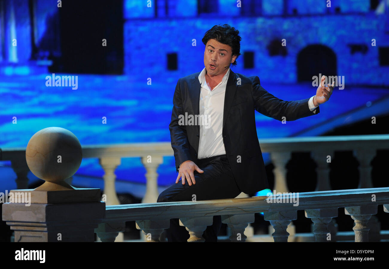 Italian tenor Vittorio Grigolo performs on stage during the TV show by public broadcaster ZDF 'Willkommen bei Carmen Nebel' in Berlin, Germany, 24 March 2012. Photo: Joerg Carstensen Stock Photo