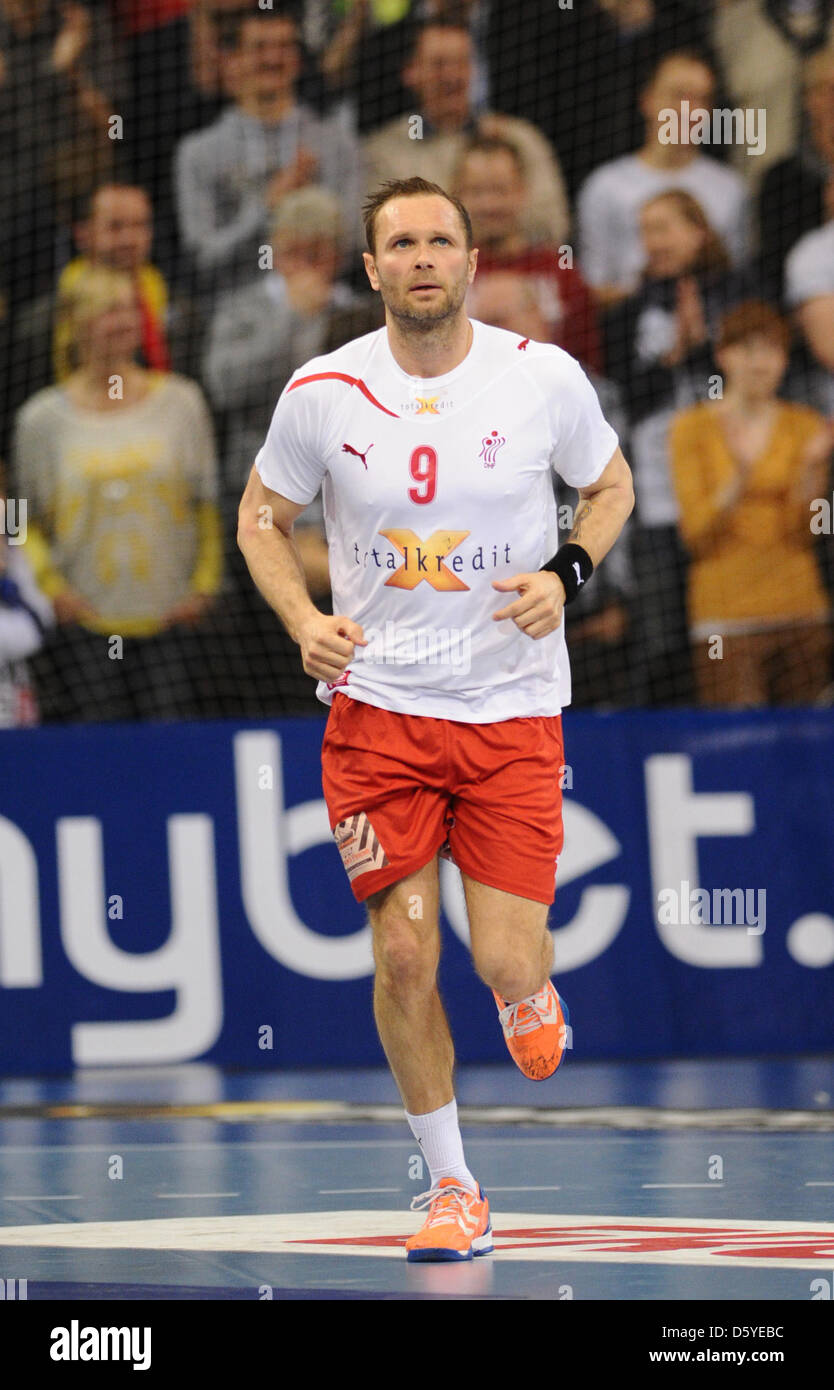Denmark's Lars Christiansen runs across the court during the international  handball match between Germany and Denmark at the Campushalle in Flensburg,  Germany, 07 April 2012. Photo: CHRISTIAN CHARISIUS Stock Photo - Alamy