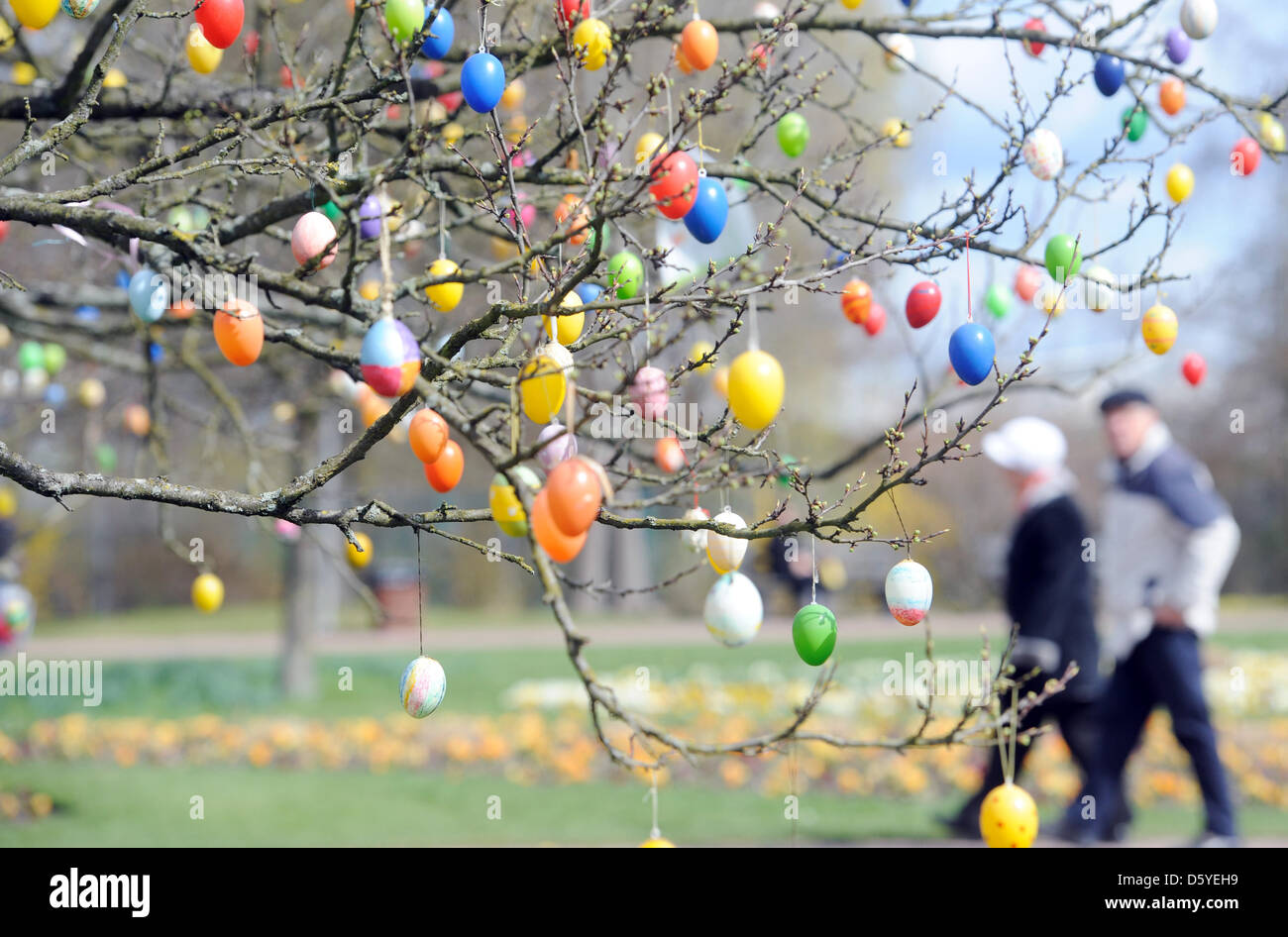 People take a walk on Easter Sunday at Britzer Garten (park) in Berlin