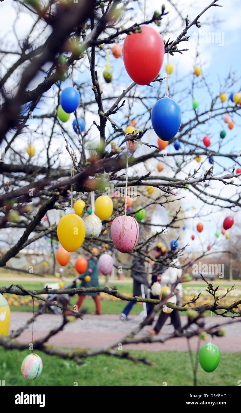 People take a walk on Easter Sunday at Britzer Garten (park) in Berlin
