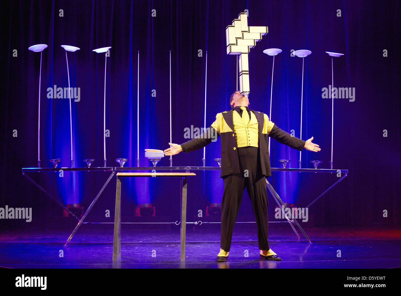 French plate juggler David Burlet performs on stage during the photo