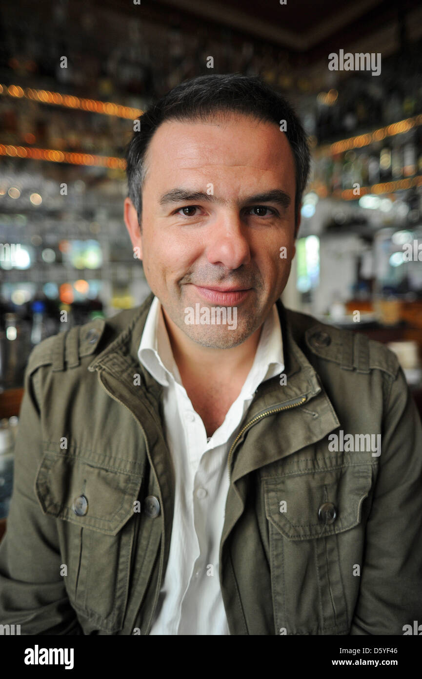 Actor, director and screenwriter Carlos Lobo poses in a cafe in Cologne, Germany, 23 October 2102. Lobo is the German dubbing voice of the Spanish actor Javier Bardem in the new James Bond movie 'Skyfall'. Photo: HENNING KAISER Stock Photo