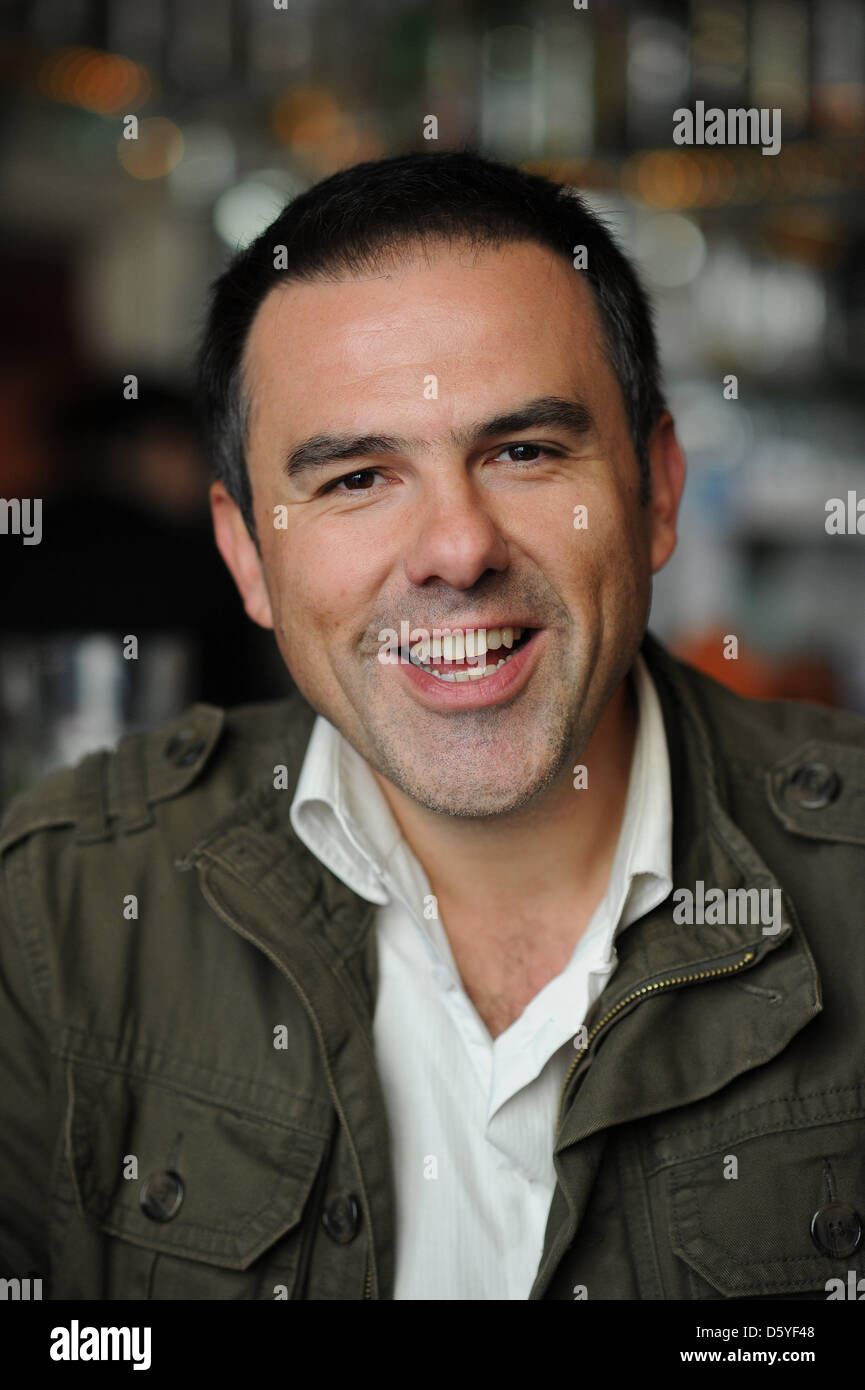 Actor, director and screenwriter Carlos Lobo poses in a cafe in Cologne, Germany, 23 October 2102. Lobo is the German dubbing voice of the Spanish actor Javier Bardem in the new James Bond movie 'Skyfall'. Photo: HENNING KAISER Stock Photo