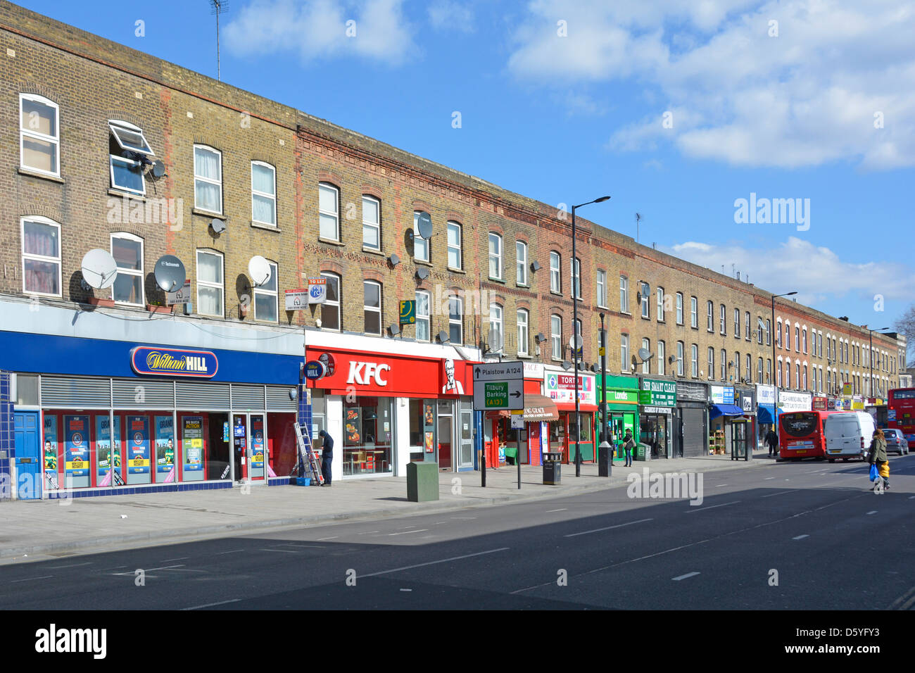 Shopping street and shop units with flats above in Canning Town Stock Photo