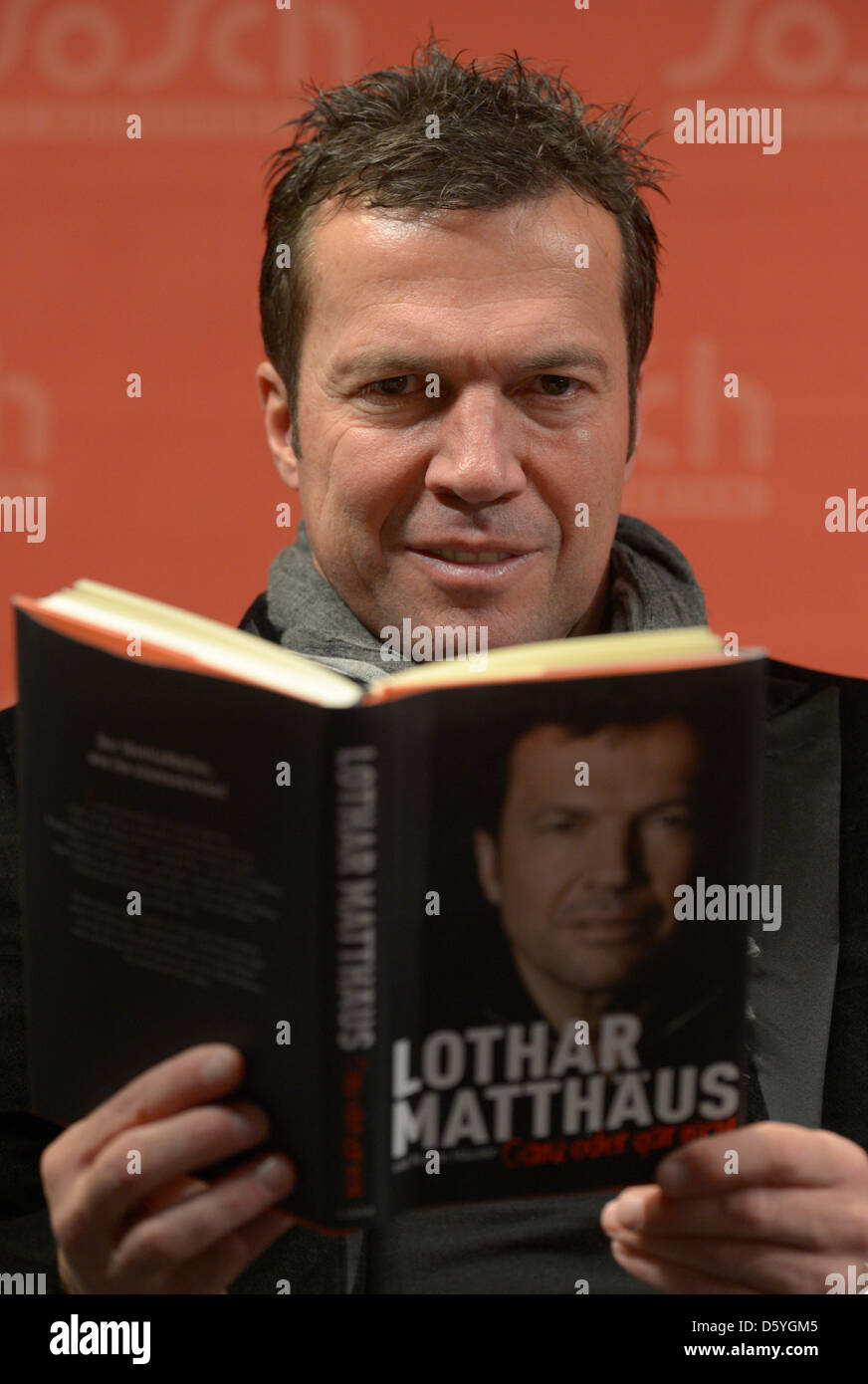 Former German national soccer player Lothar Matthaeus presents his autobiography 'Ganz oder gar nicht' (All or Nothing) at a book store in Berlin, Germany, 24 October 2012. Photo: Rainer Jensen Stock Photo