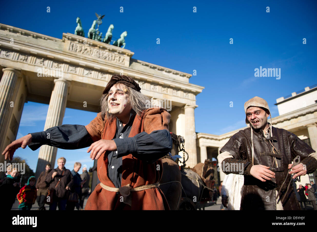 Actors of the Berlin Dungeon in horror costumes are pictured during a press appointment at the Brandenburg Gate in Berlin, Germany, 26 October 2012. The Berlin Dungeon, which is being created close to Hackescher Markt will tell the story of Berlin from spring of 2013 on. Photo: MARC TIRL Stock Photo