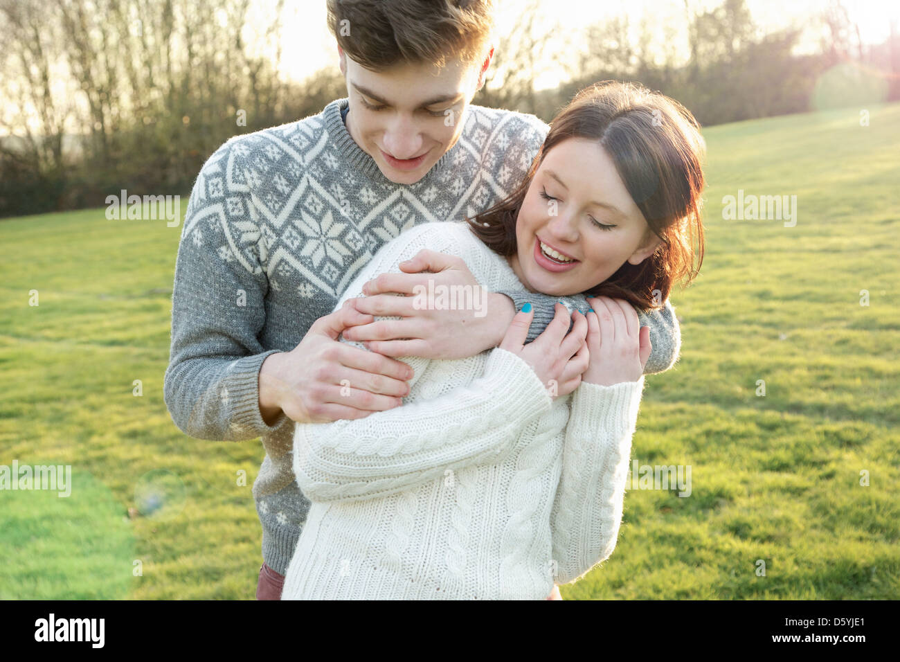 2 young men hugging hi-res stock photography and images - Alamy