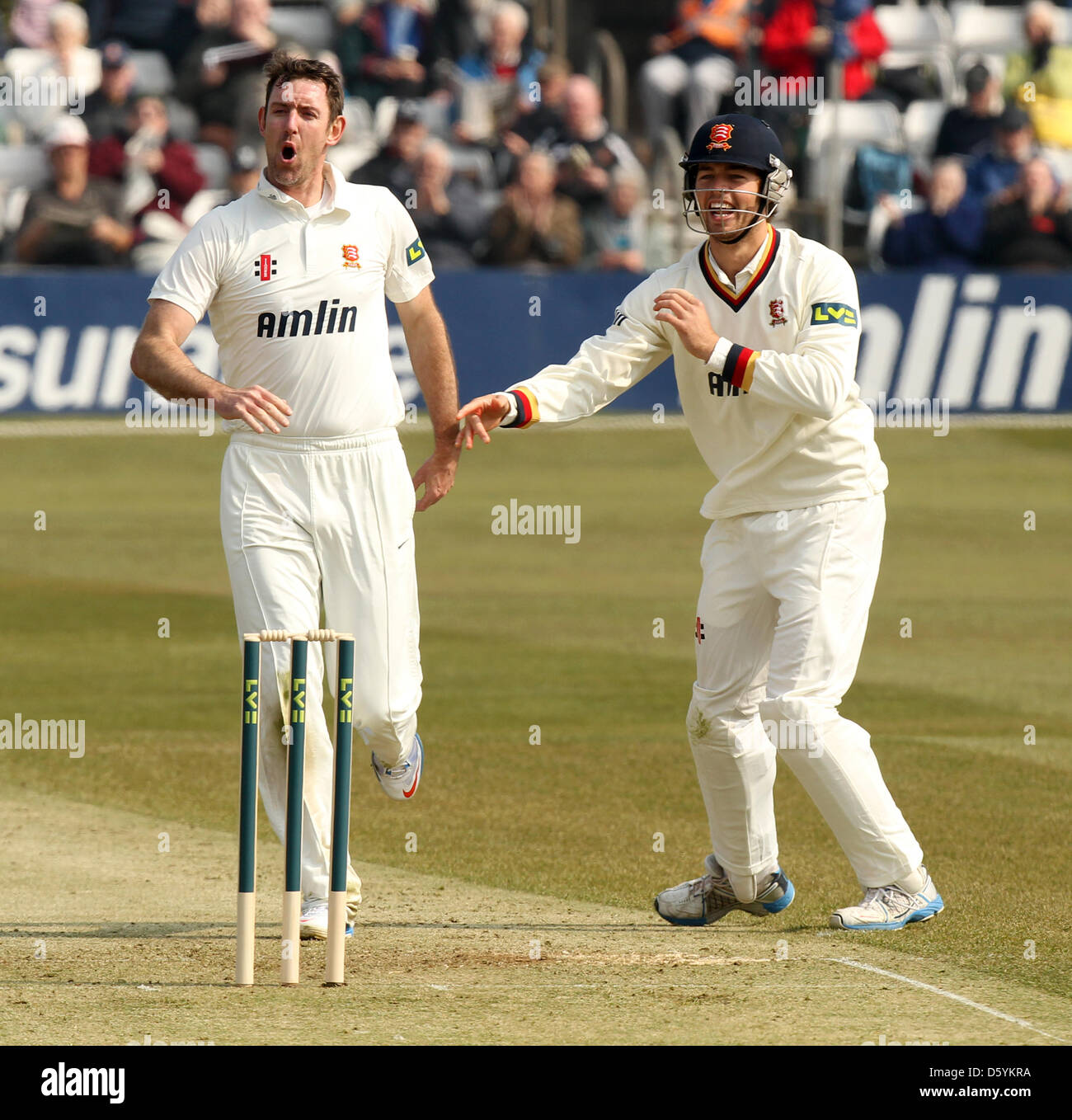 Chelmsford, Essex, UK. 10th April 2013. David Masters and Ben Foakes celebrate the first wicket of the season (Chris Dent) LV County Championship -  Essex CCC vs Gloucestershire CCC. Credit: Action Plus Sports Images / Alamy Live News Stock Photo