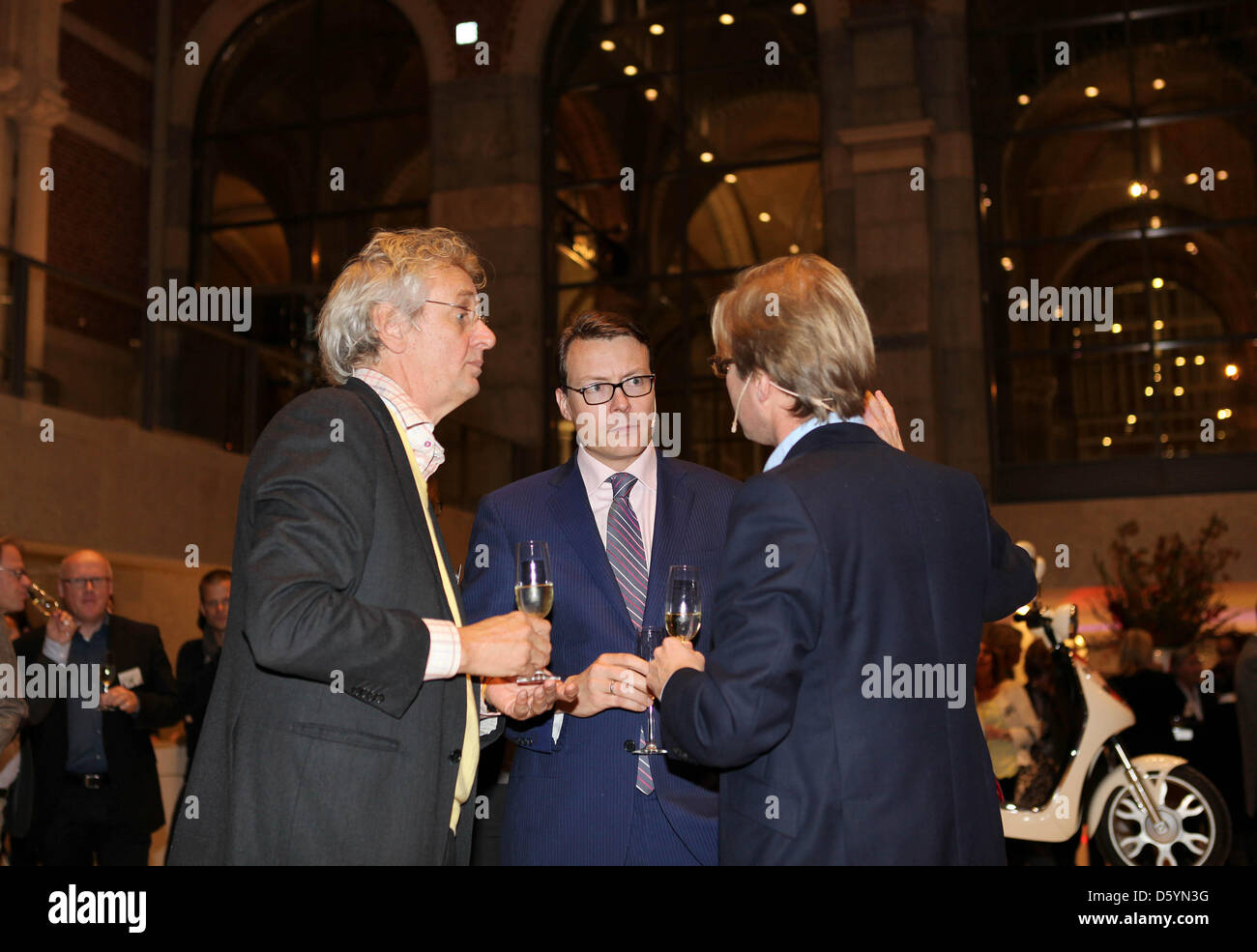 Boudewijn Poelmann (L-R), director of BankGiroLoterij, Prince Constantijn of the Netherlands and Taco Dibbits, Director of Collections at the Rijksmuseum, open the digital archive of the Rijksmuseum in Amsterdam, The Netherlands, 30 October 2012. The Rijksmuseum has lanched the 'Rijks Studio', a digital on-line archive with 125.000 objects of the collection. Photo: RPE-Albert Niebo Stock Photo