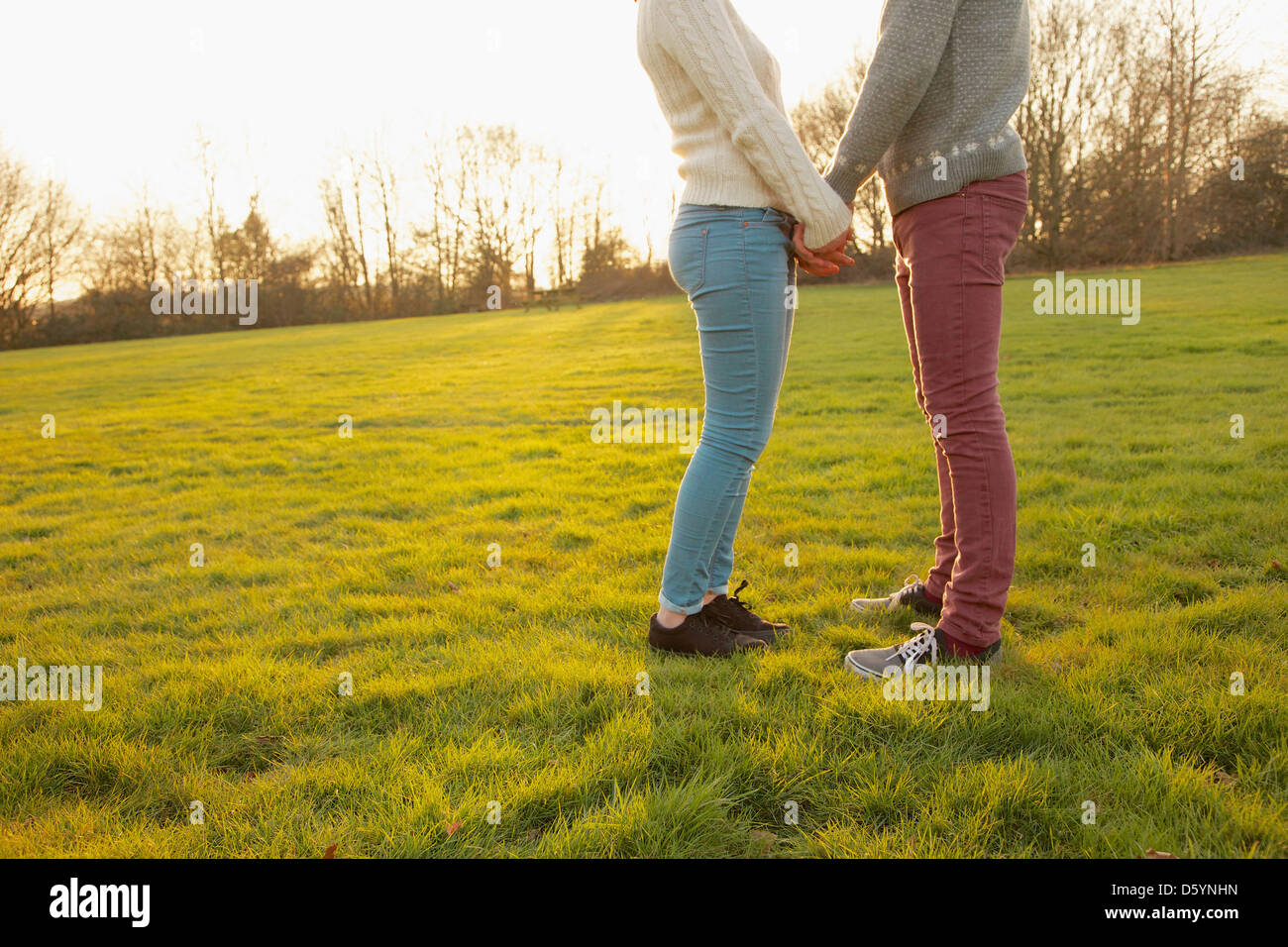 Couple teenager holding hands hi-res stock photography and images - Alamy