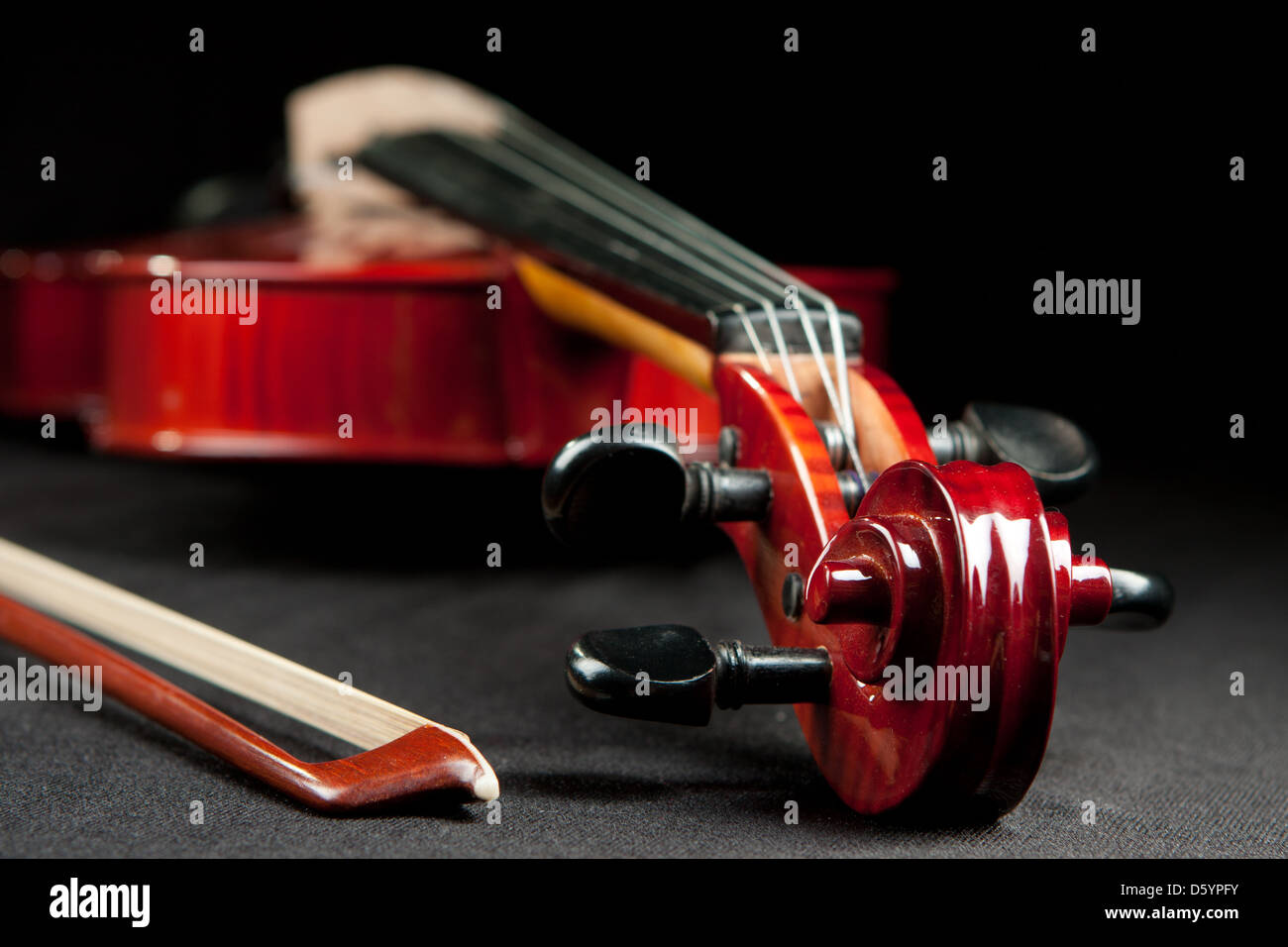 beautiful violin and bow on dark bakground Stock Photo