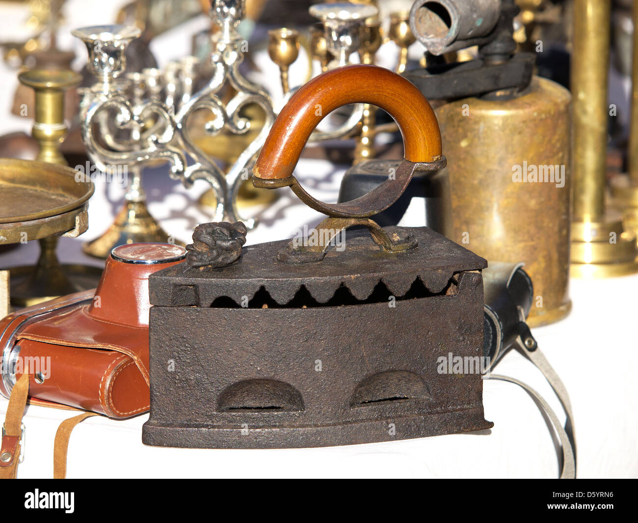 old antique iron selling on the open market Stock Photo Alamy