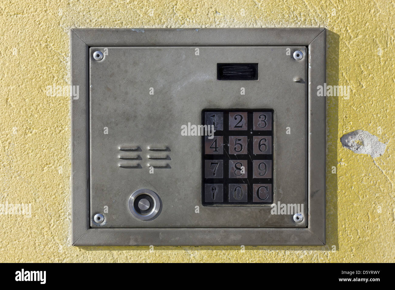 old door lock with numeric keypad Stock Photo