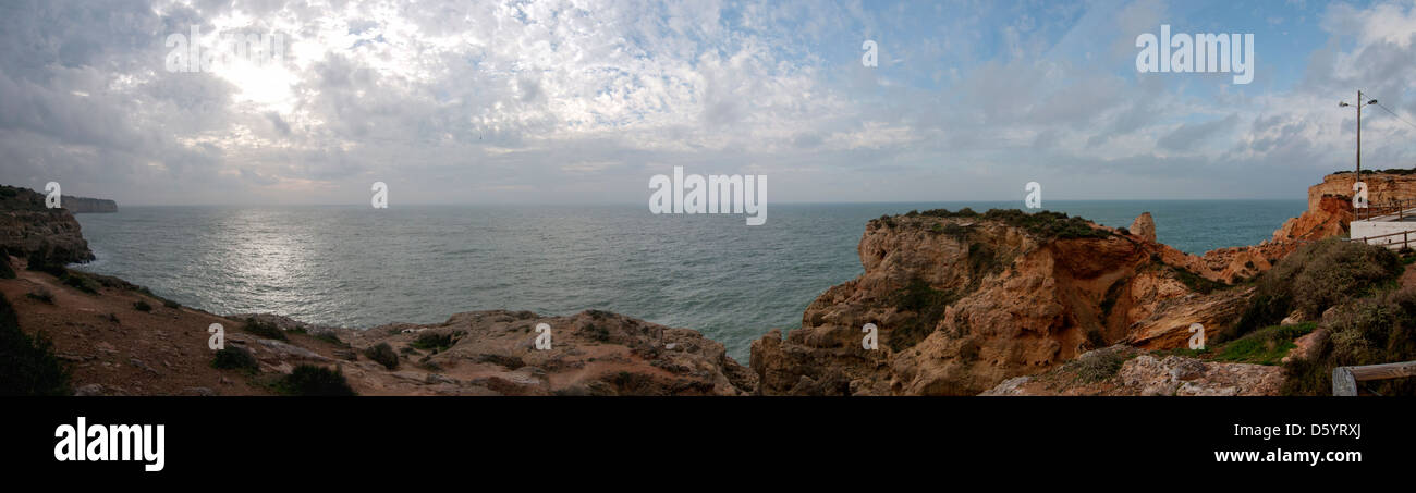 rocky coast at Algar Seco Carvoeiro Algarve Portugal a panoramic scene Stock Photo